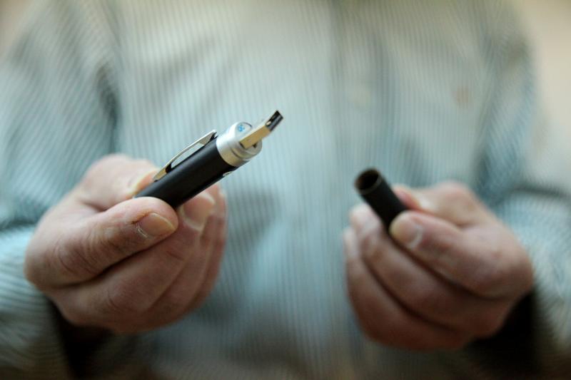 The internal USB connection of a pen that records audio and video.
